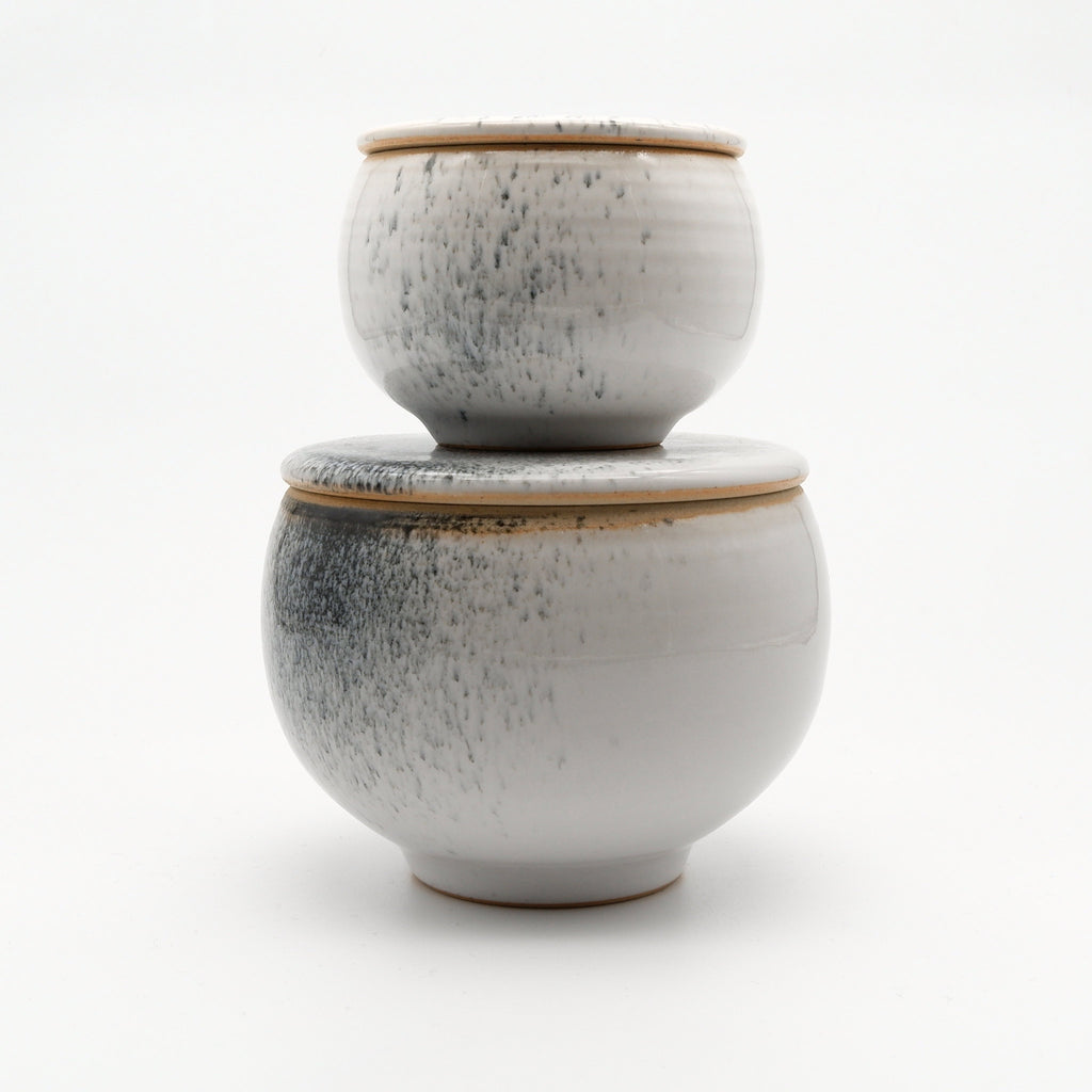 Two lidded jars XS and M