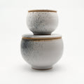 Two lidded jars XS and M