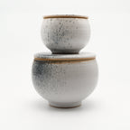 Two lidded jars XS and M