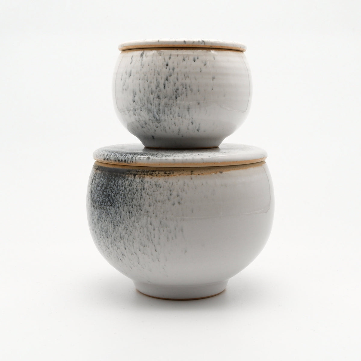 Two lidded jars XS and M