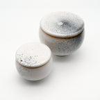 Two lidded jars XS and M